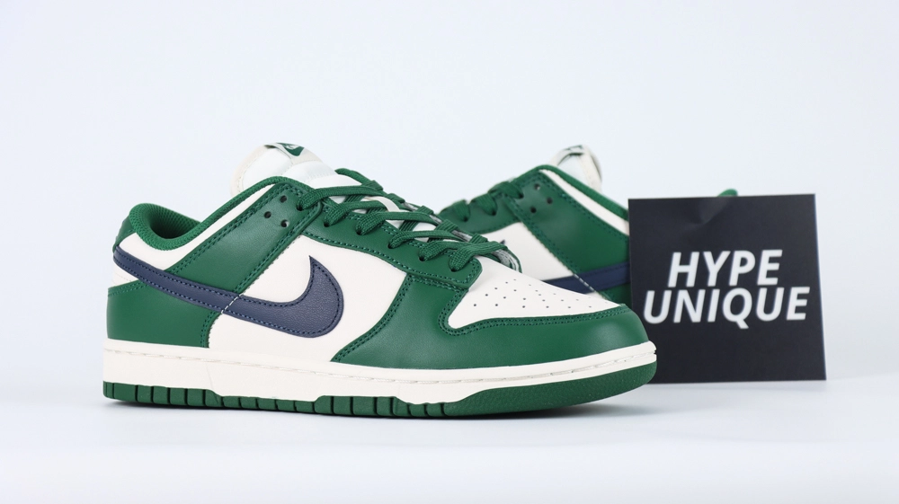 Green and white low-top sneakers photographed from the side